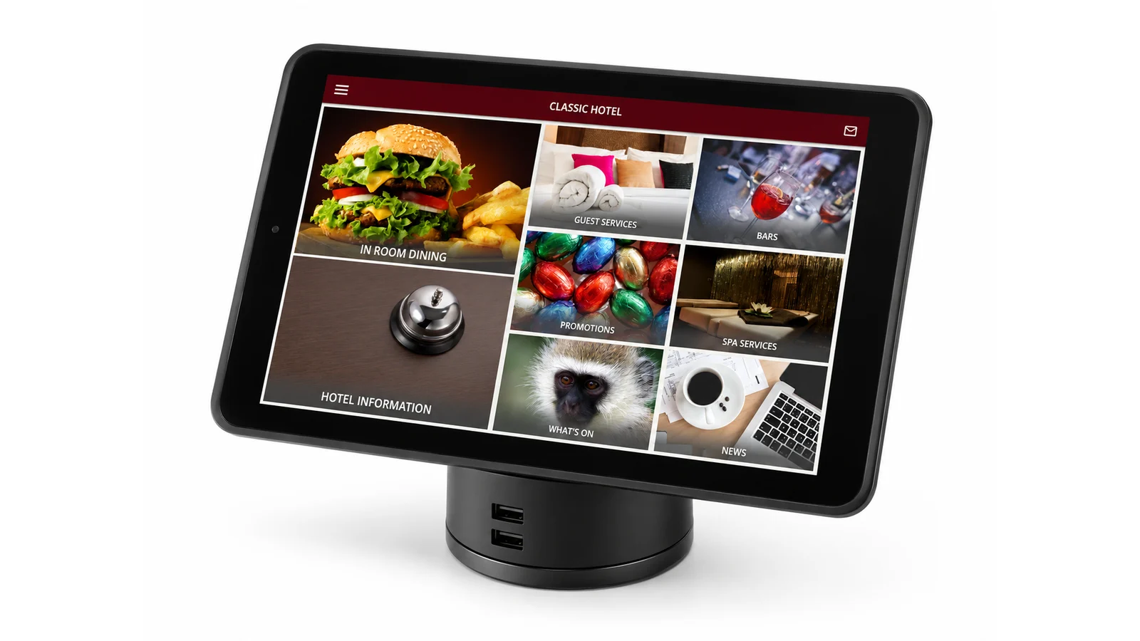 A Tapendium in-room hotel tablet on its dock showing the guest home screen for a hotel — tiles for in-room dining, guest services, bars, promotions, spa services, what's on, hotel information and news.